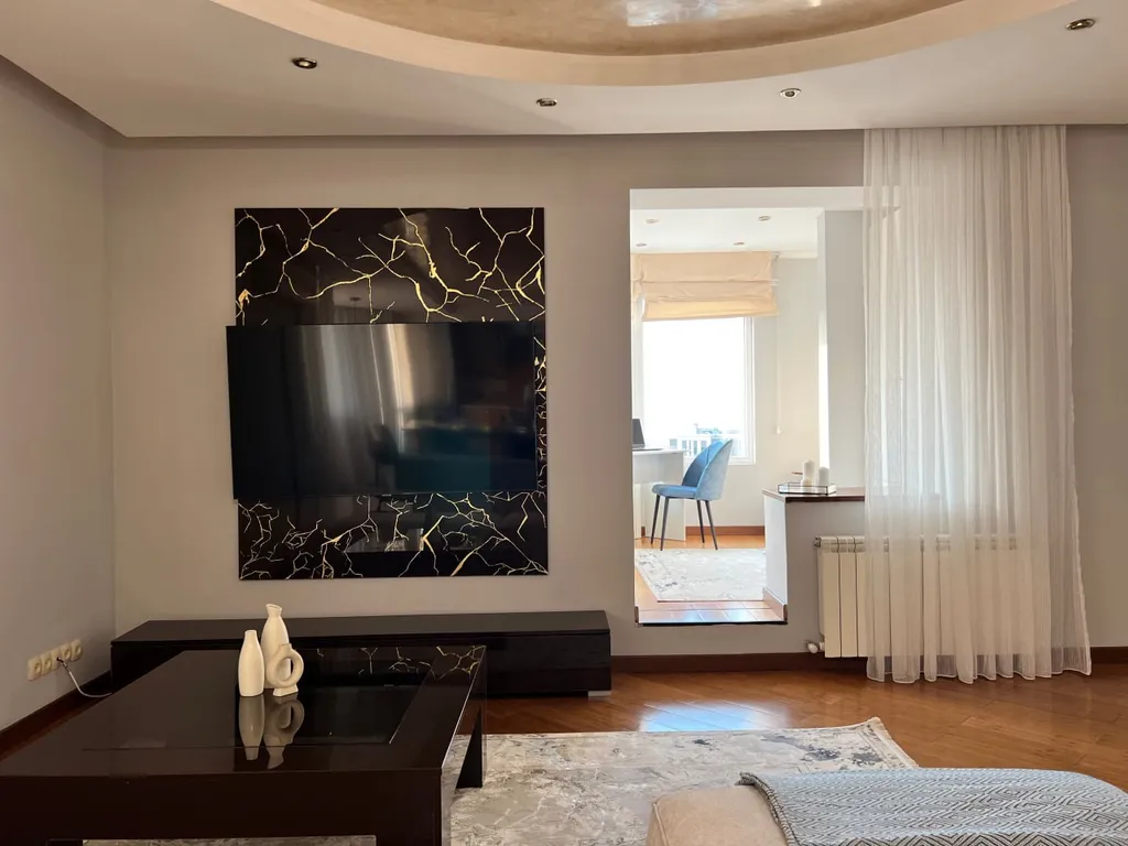 Уютная квартира с прекрасными видами в центре Алматы