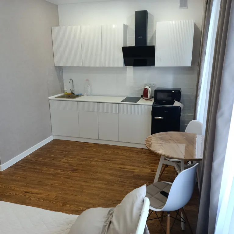 Уютная студия в зеленом массиве