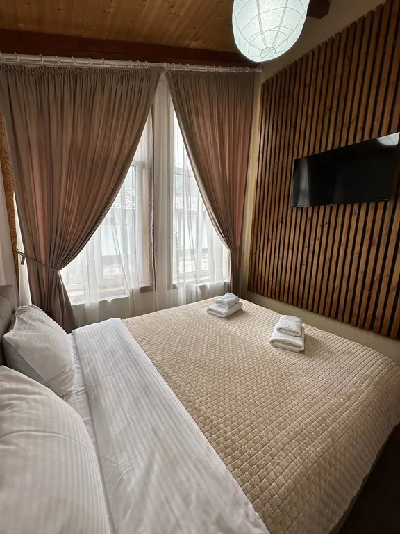 Коттедж Трёхкомнатные апартаменты с видом на горы — Архыз