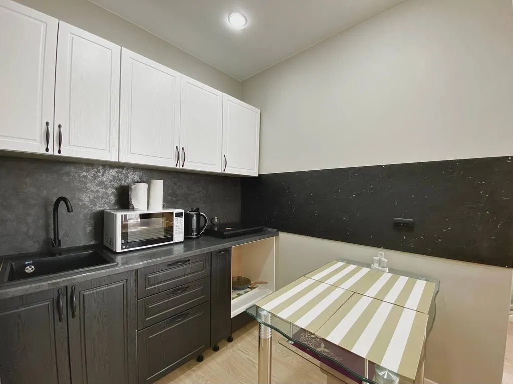 Студия на высоком этаже в центре города