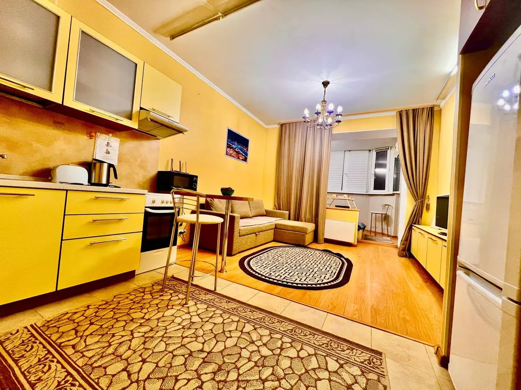 Квартира Уютная светлая студия в центре, ТЦ Вояж, парковка, кафе, аквапарк источник — Тюмень