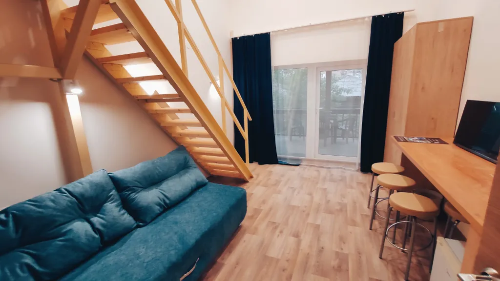 Четырёхместный стандарт с  широкими кроватями на двух уровнях