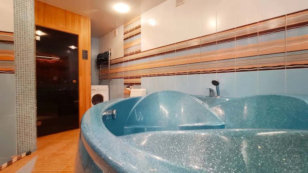 Квартира с джакузи и ИФК-сауной