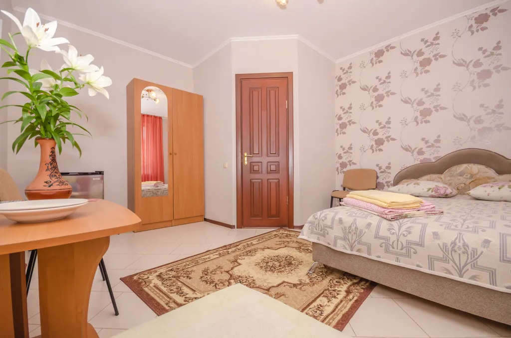 Двухместный Стандарт с двуспальной кроватью и дополнительным местом