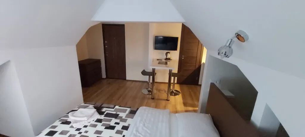 Квартира-студия на мансардном этаже