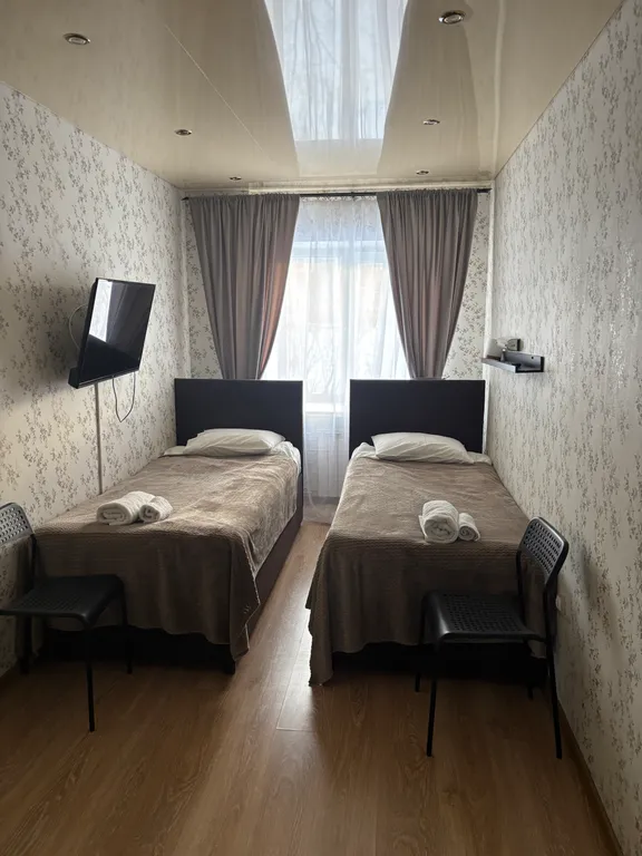 Уютная евротрешка с большой гостиной и двумя спальнями с видом на горы