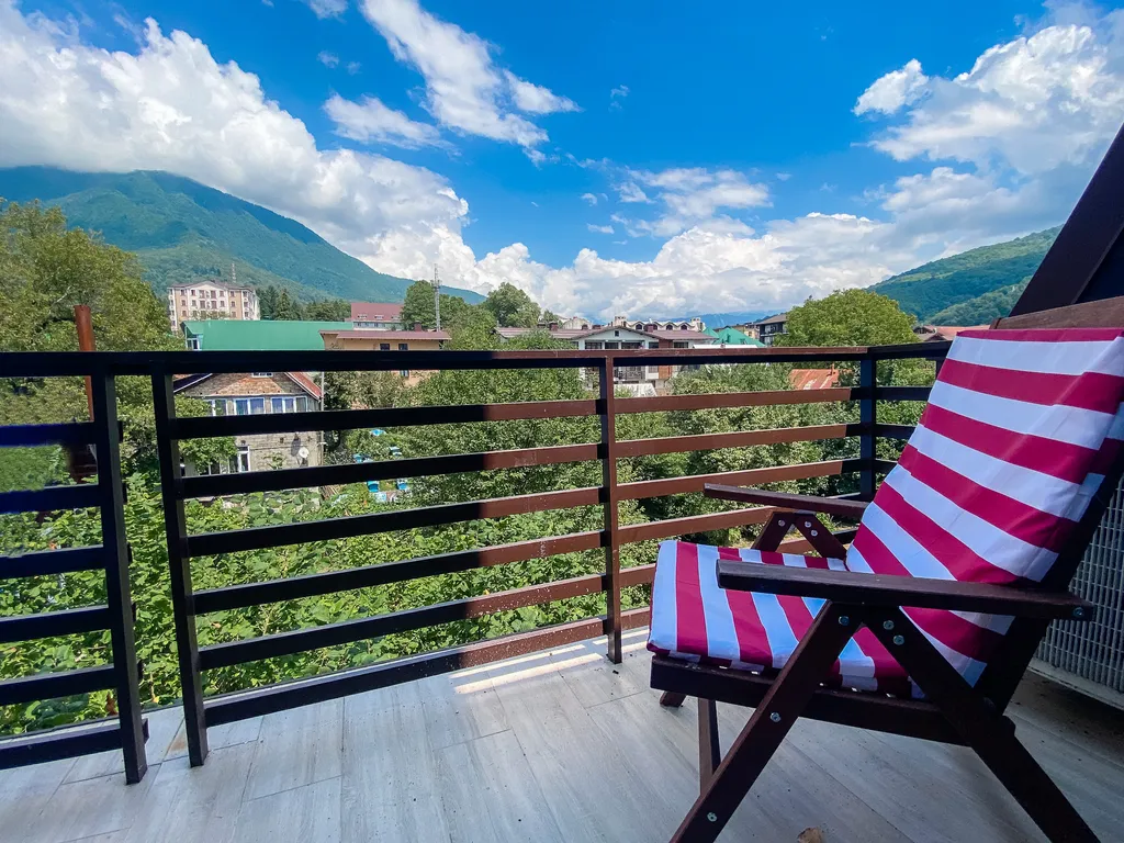 Апартаменты с террасой с панорамным видом на горы