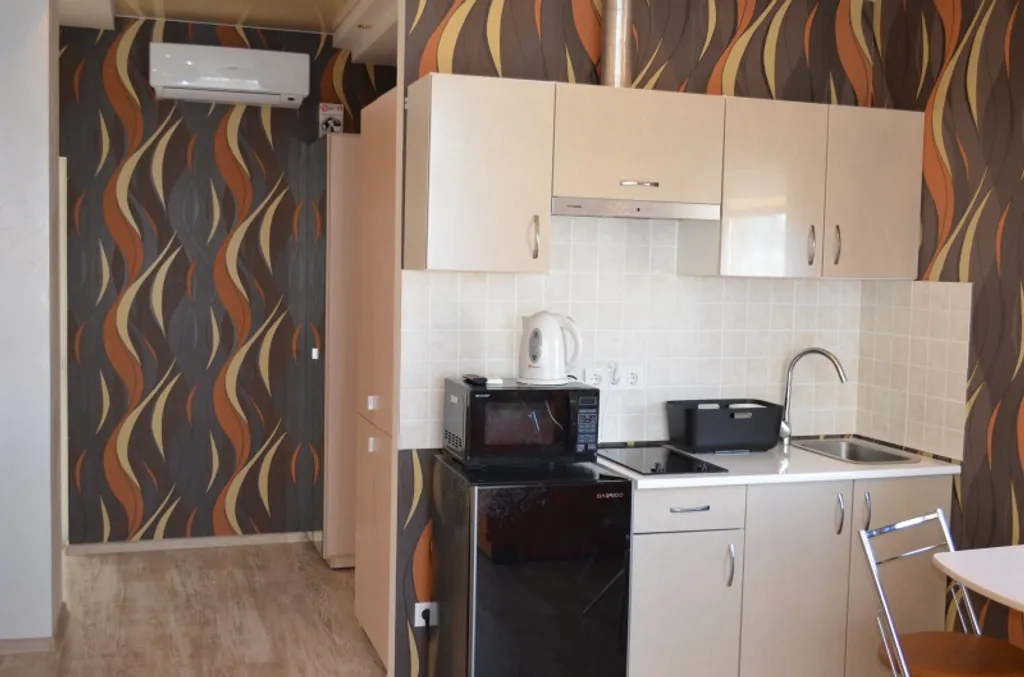 Видовая уютная студия с двумя балконами под горой Кошка