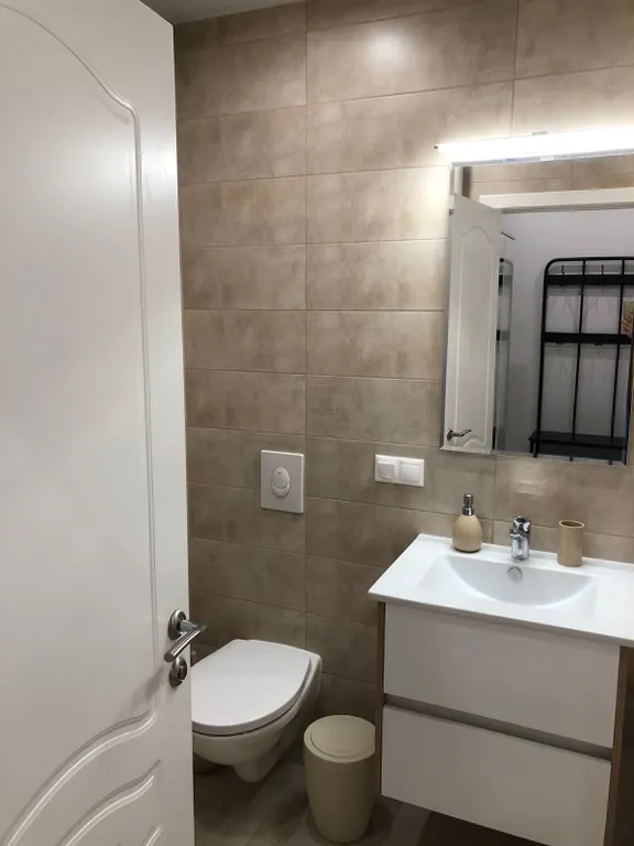 Уютная квартира с отдельной спальней в олимпийском парке