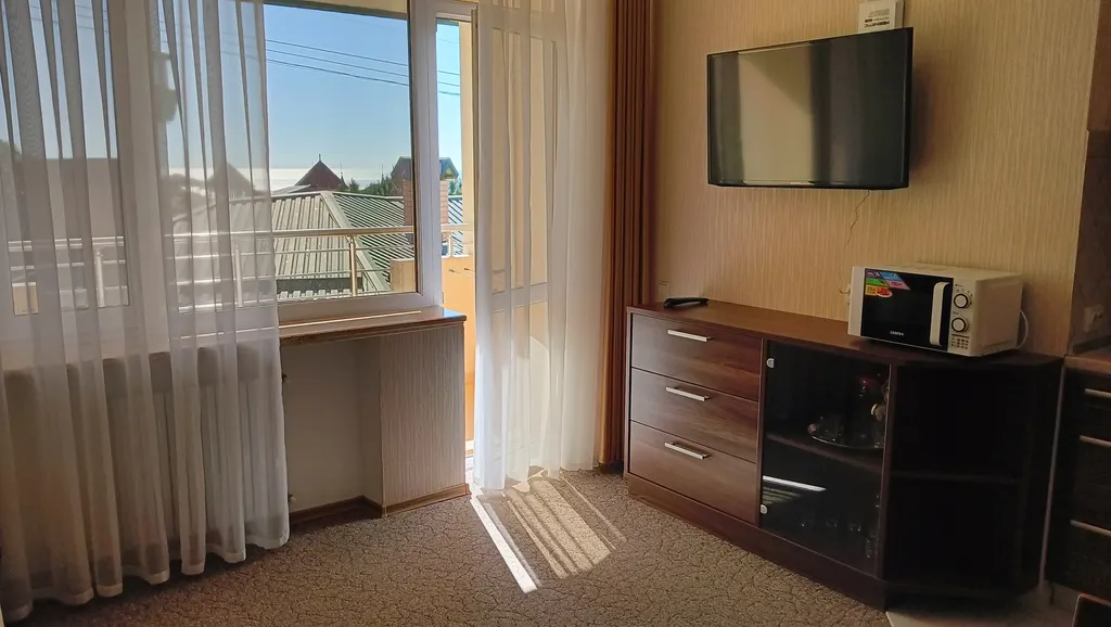 Номер с кухней-гостиной