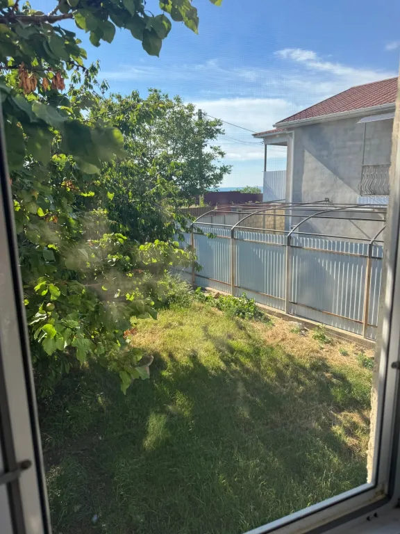 Уютный домик у моря со своим двором