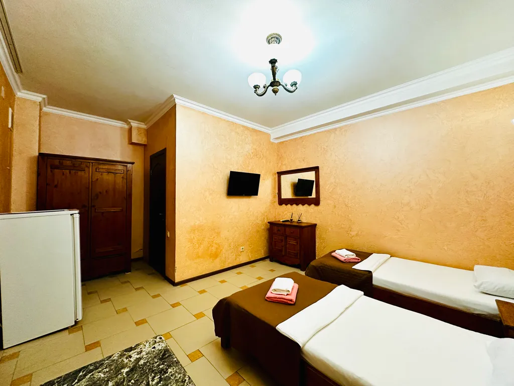 Квартира Квартира Уютные номера на 1 этаже в гостевом доме Эльбрус на 1 линии в Адлере — Адлер