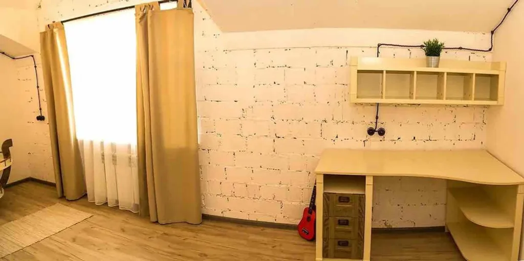 Двухуровневые апартаменты с отдельной спальней