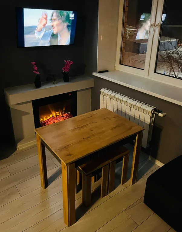 Квартира с необычной планировкой, камином и кондиционером