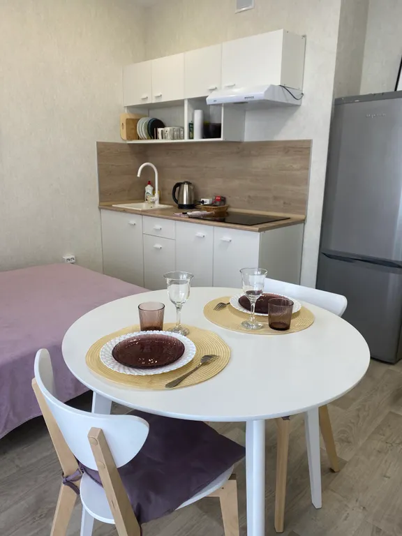 Уютная студия с видом на город