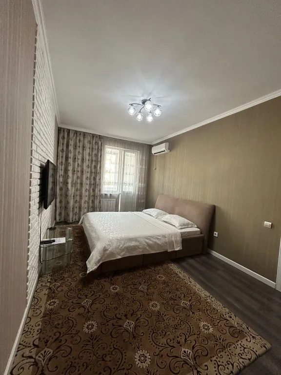 Уютная квартира напротив Алматы Арены