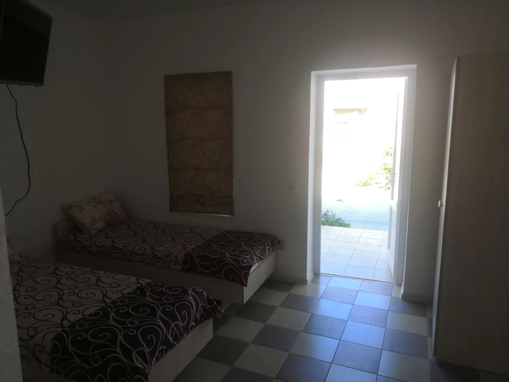 Апартаменты двухкомнатные, пятиместные, первый этаж