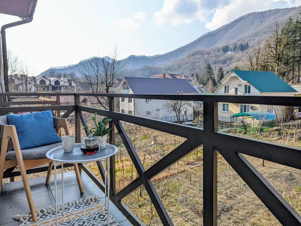 Двухуровневая квартира с балконом в центре