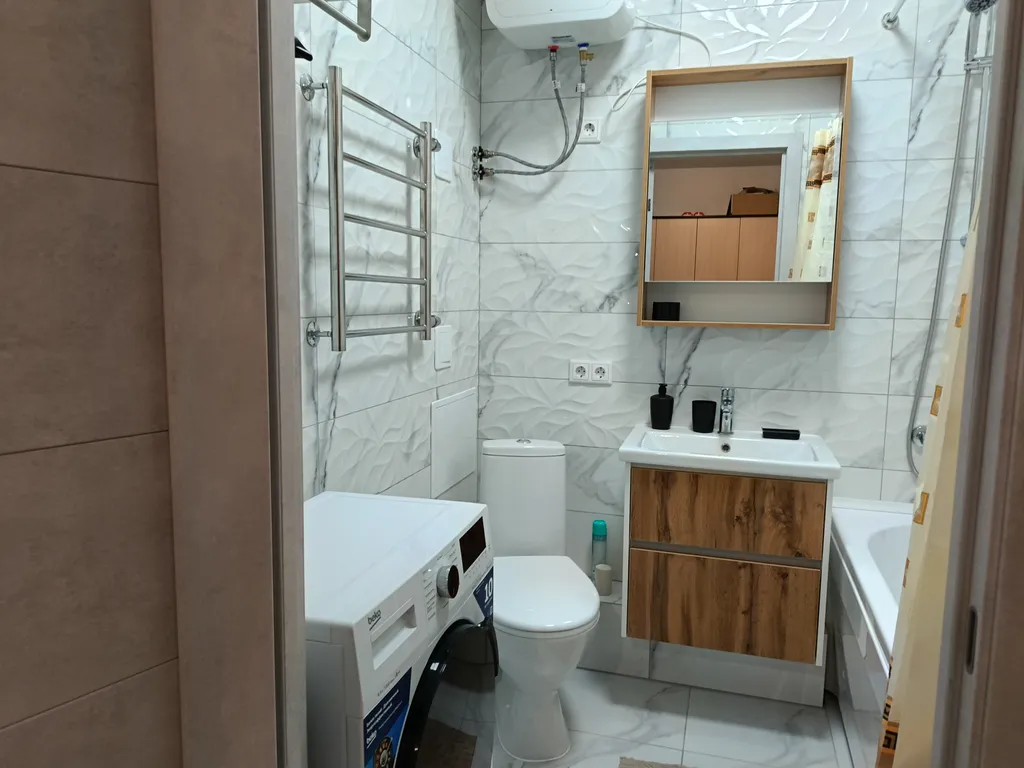 Уютная квартира в новом доме, в центре города