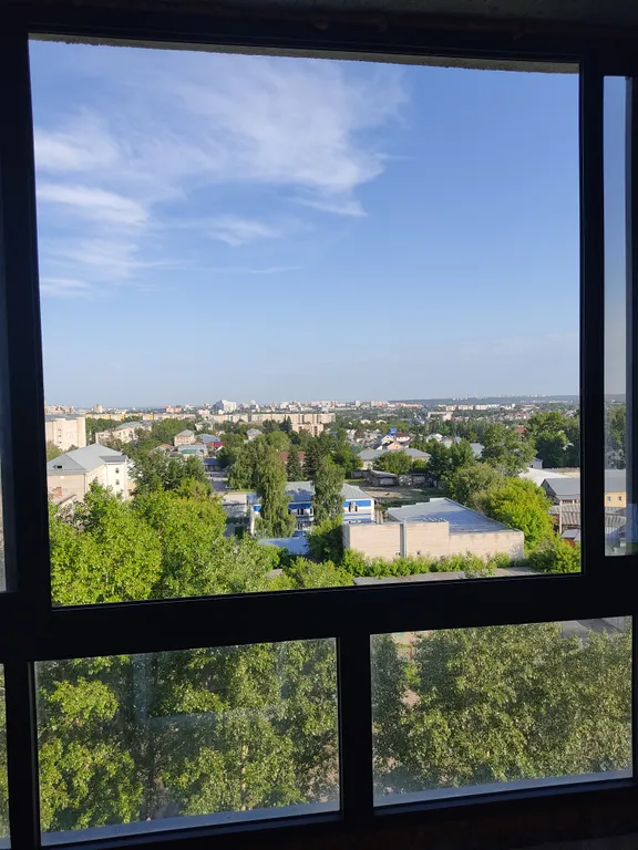 Уютная студия с видом на город