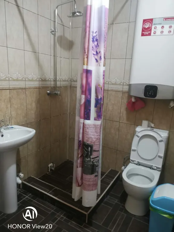 Уютный 3-х этажный коттедж в центре Домбая