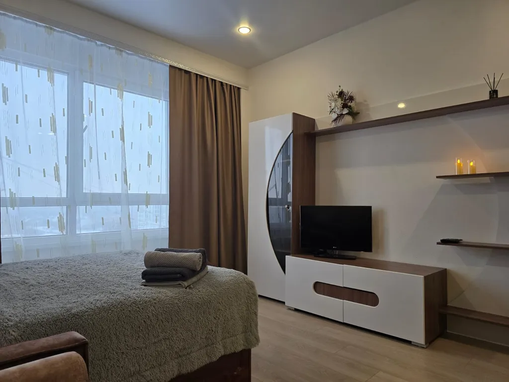 Уютная студия с видом на город