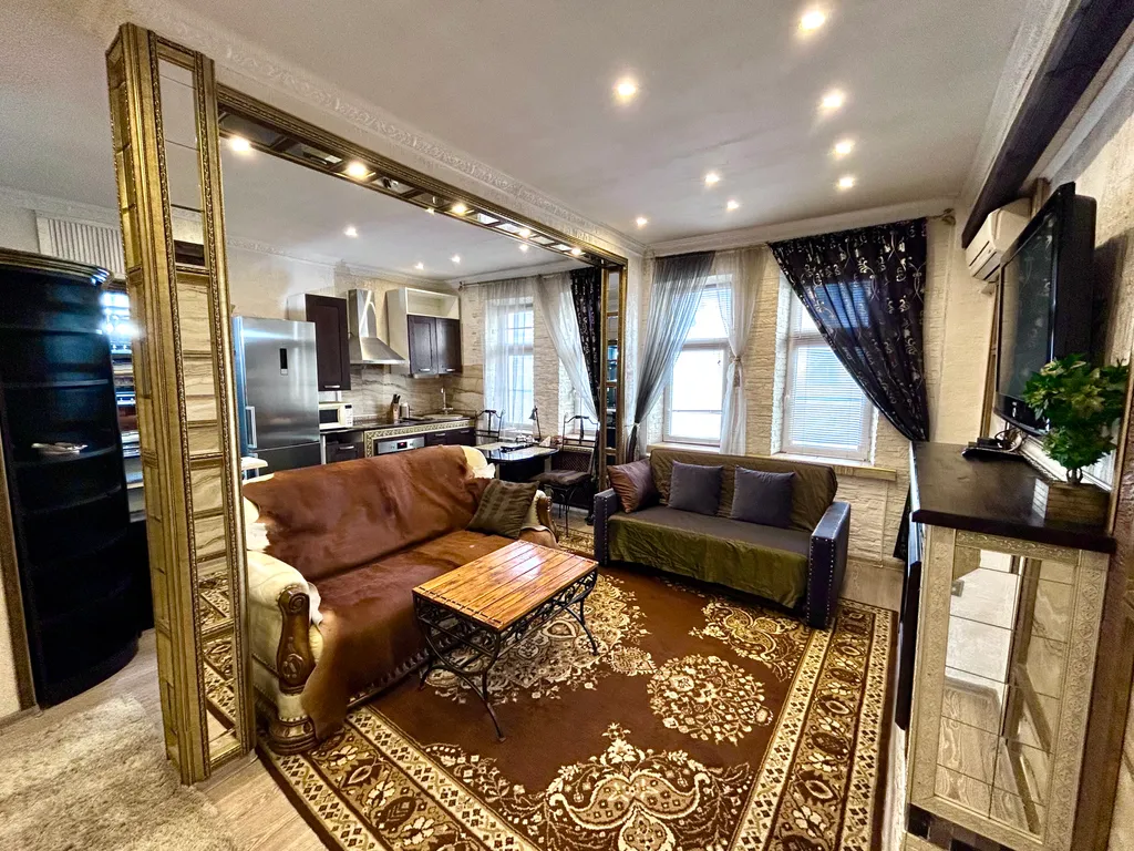 Уютные апартаменты у моря с камином и дизайнерским ремонтом