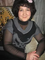 Мила