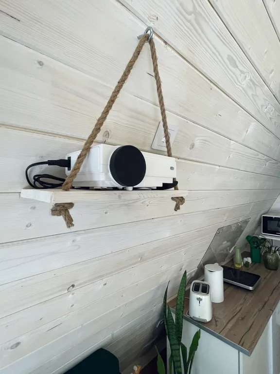 Треугольный дом