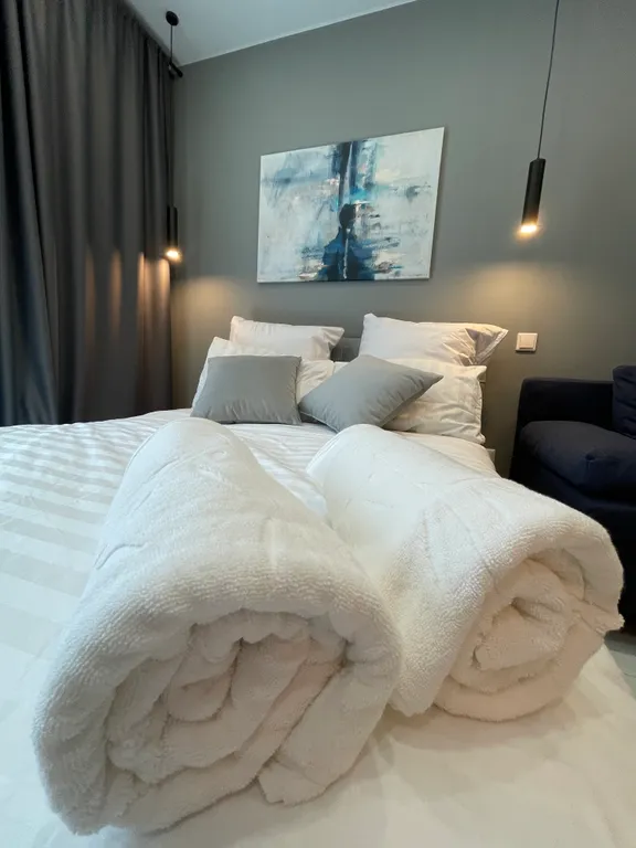 Дизайнерская сканди-студия от Vitamia art в новом ЖК комфорт-класса