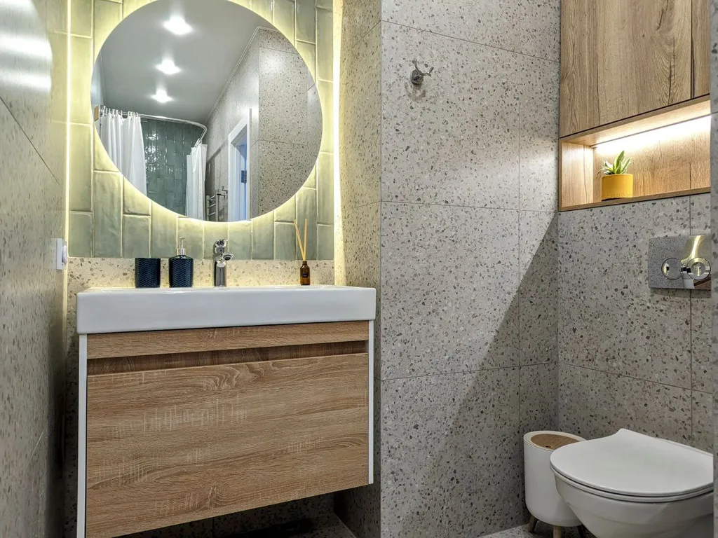 Двухуровневая квартира с балконом в центре