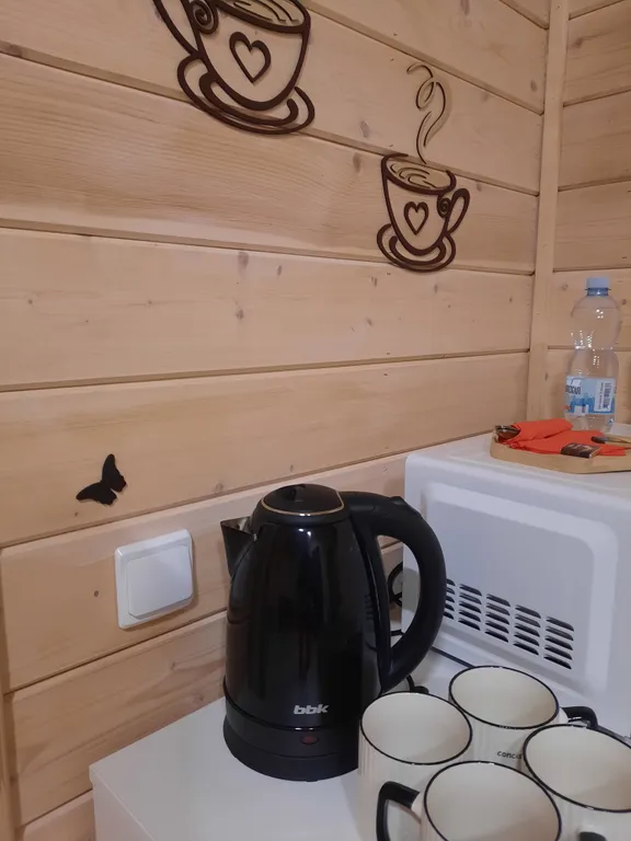 Уютный четырехместный Домик де-люкс с двухспальной кроватью