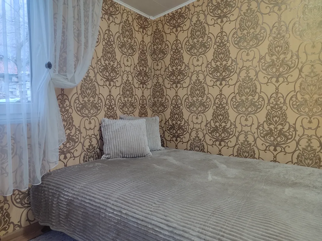 Уютный домик с отдельным двором и мангальной зоной в центре города