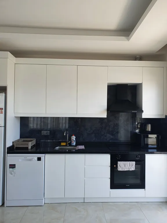 Отличные новые апартаменты 2+1 в центре Махмутлара в Алании