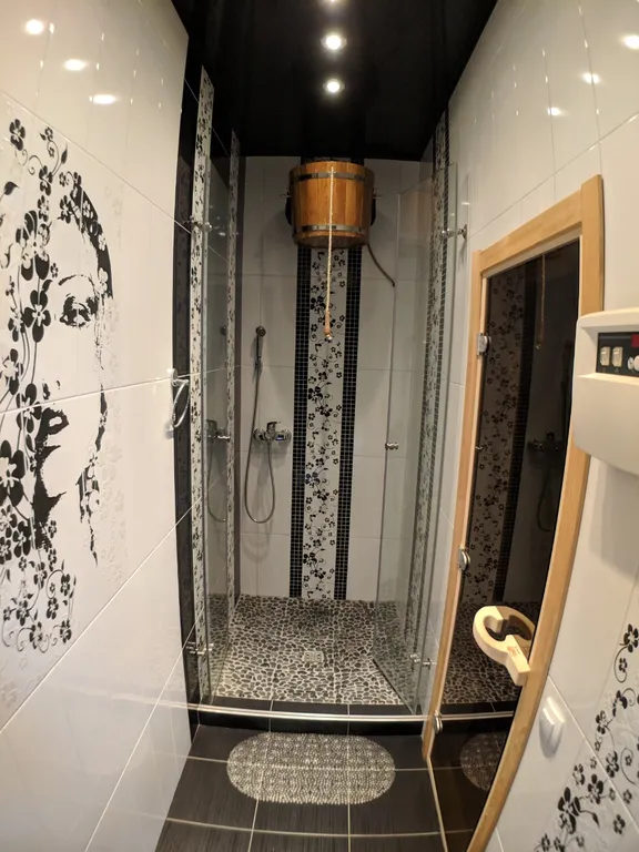 Дизайнерская двухуровневая 3-комнатная квартира с сауной и каминным залом