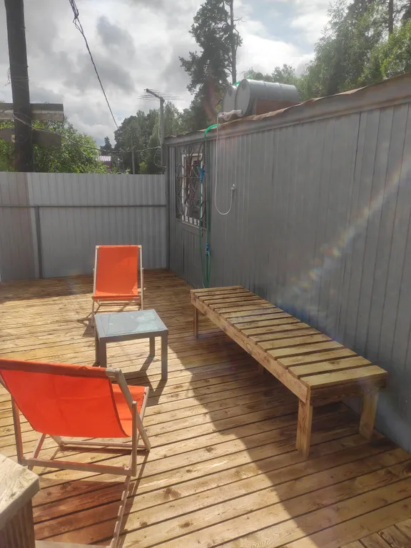 Домик с террасой в черте города