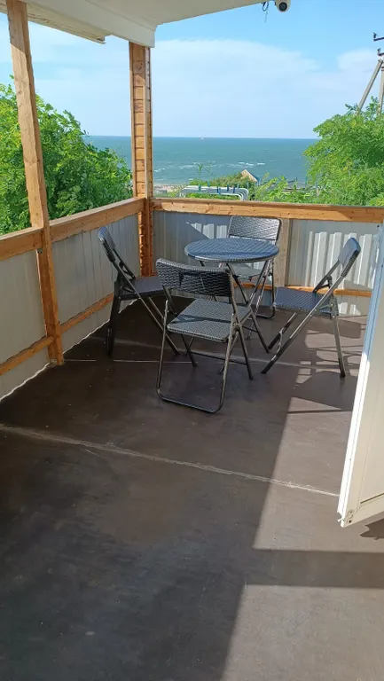 Двухуровневый номер с кухней и видом на море