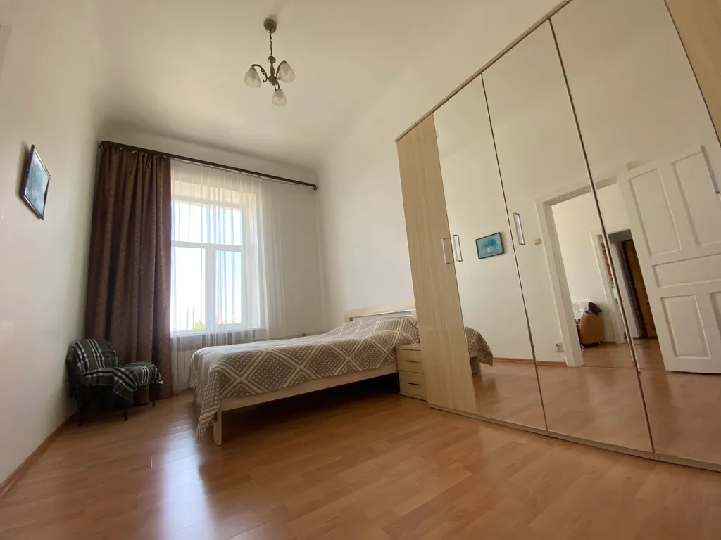 Светлая квартира в самом сердце города в историческом здании