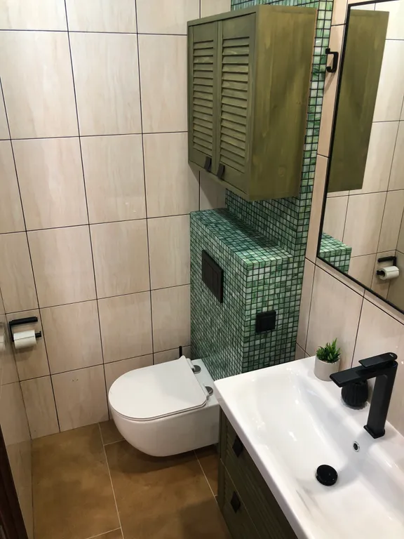 Таун-хаус в современном районе частной застройки