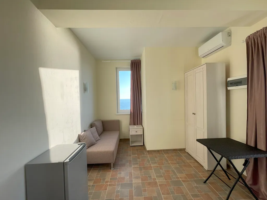 Коттедж Сдвоенные апартаменты с просторной солнечной террасой — Нижнее Учдере