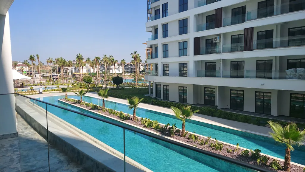 Двухуровневая квартира с собственным выходом к бассейну