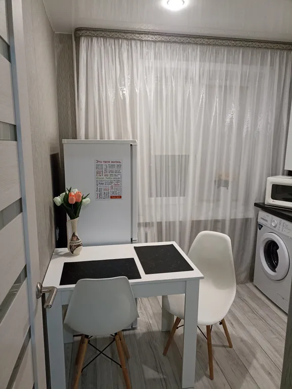 Квартира в центре на первом этаже с асфальтированной парковкой