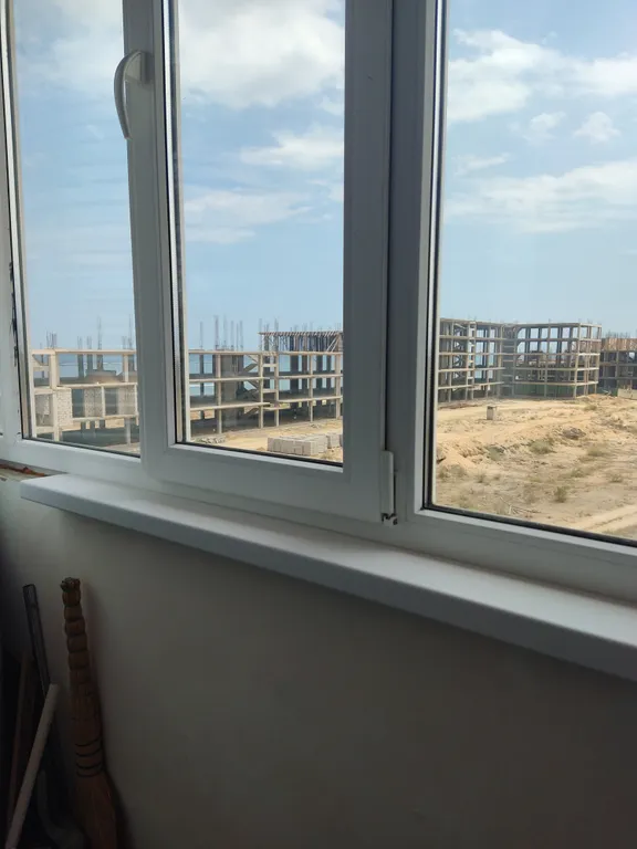 Уютная студия с балконом и видом на море