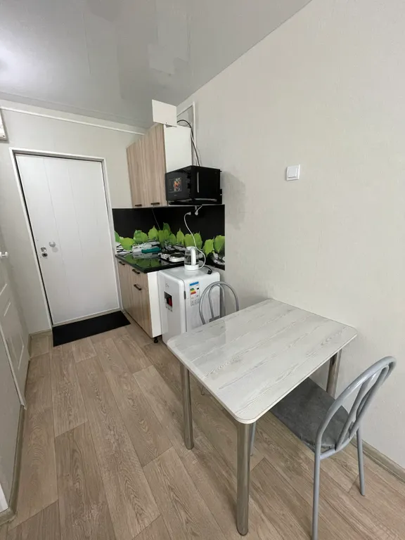 Квартира Уютная студия в центре города — Лесозаводск