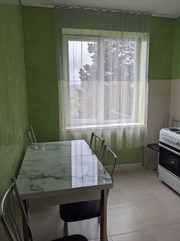 Уютная квартира в городе с видом на горы