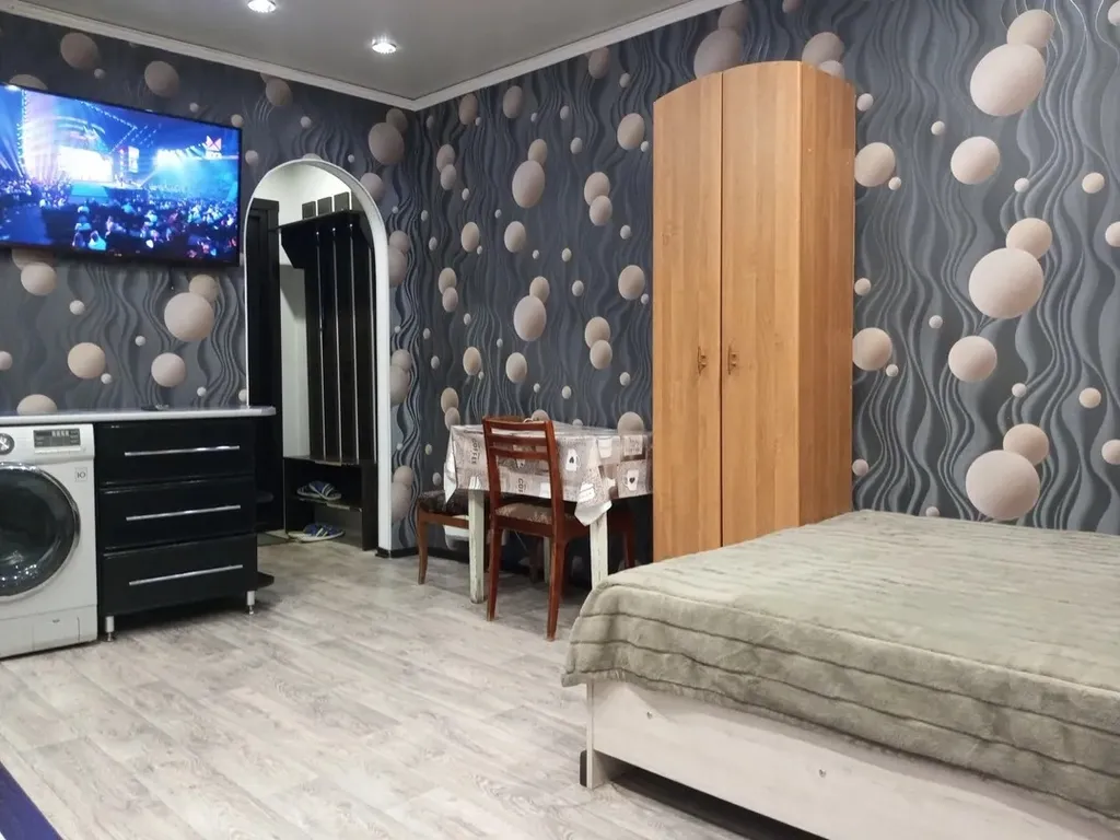 Уютная квартира в центре города и личная стоянка с видиофиксацией