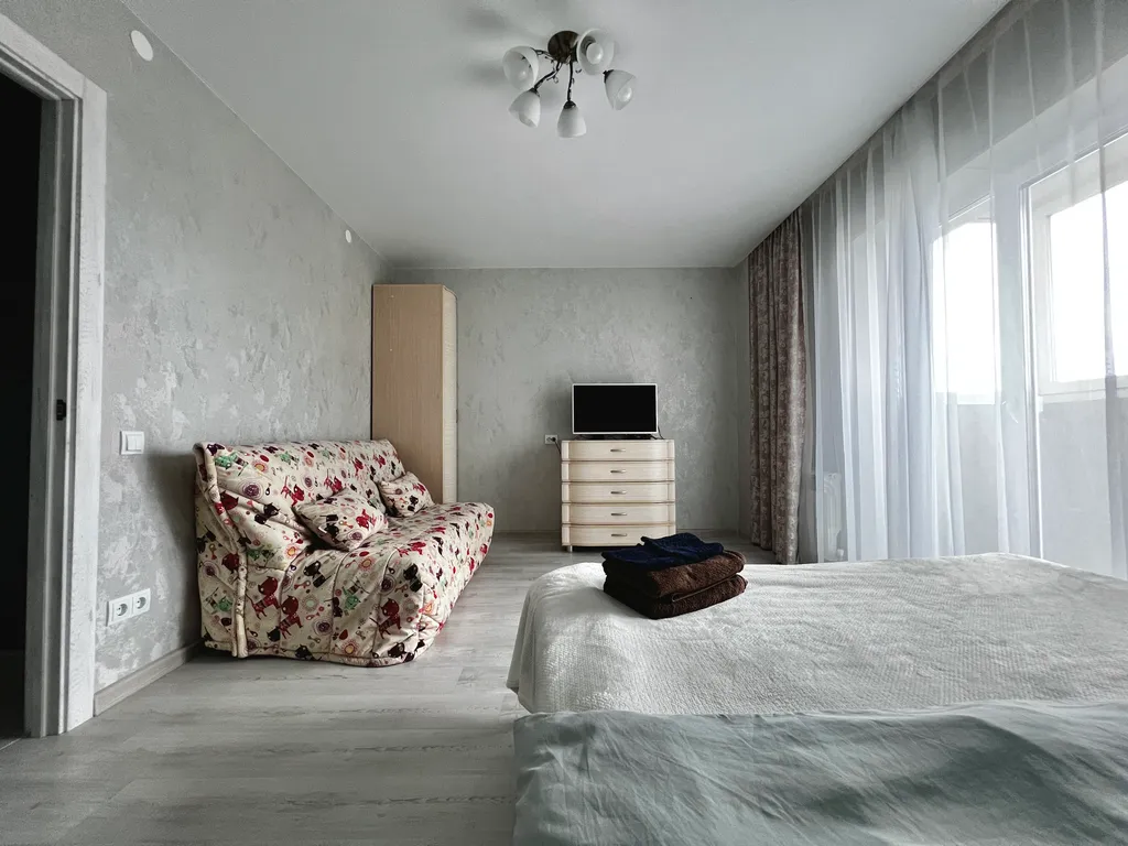 Уютная новая квартира класса люкс в 10 минутах от центра города