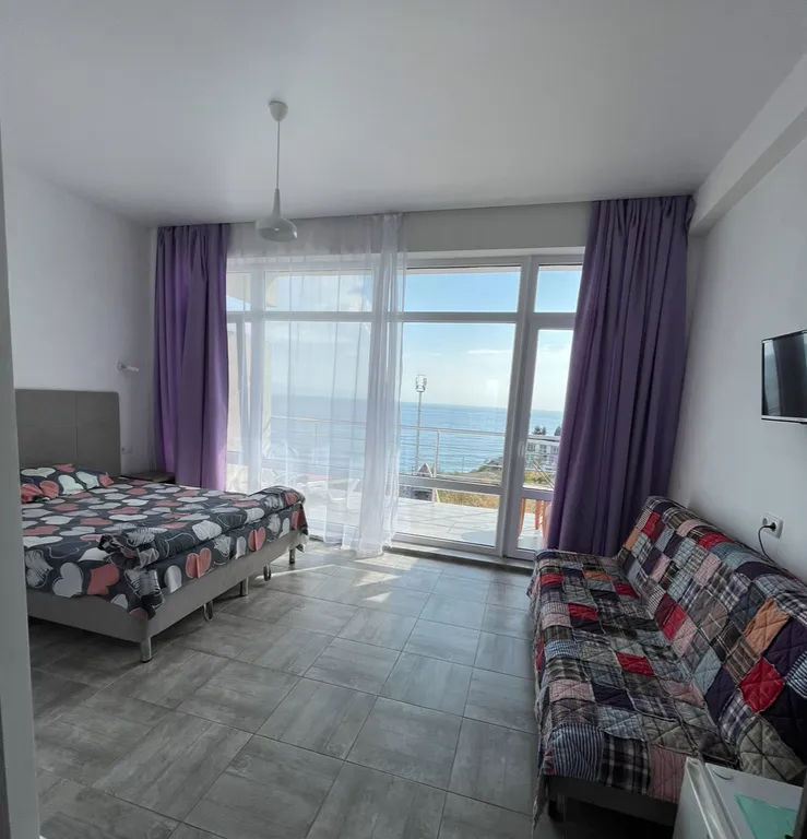 Трехместный номер с видом на море