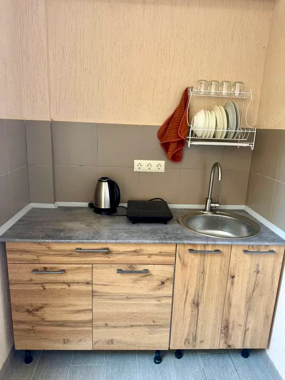 Семейный номер с кухней на веранде в центре