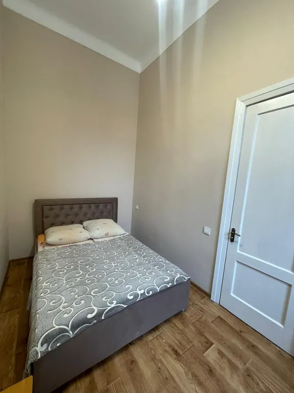 Двухкомнатная квартира с высокими потолками